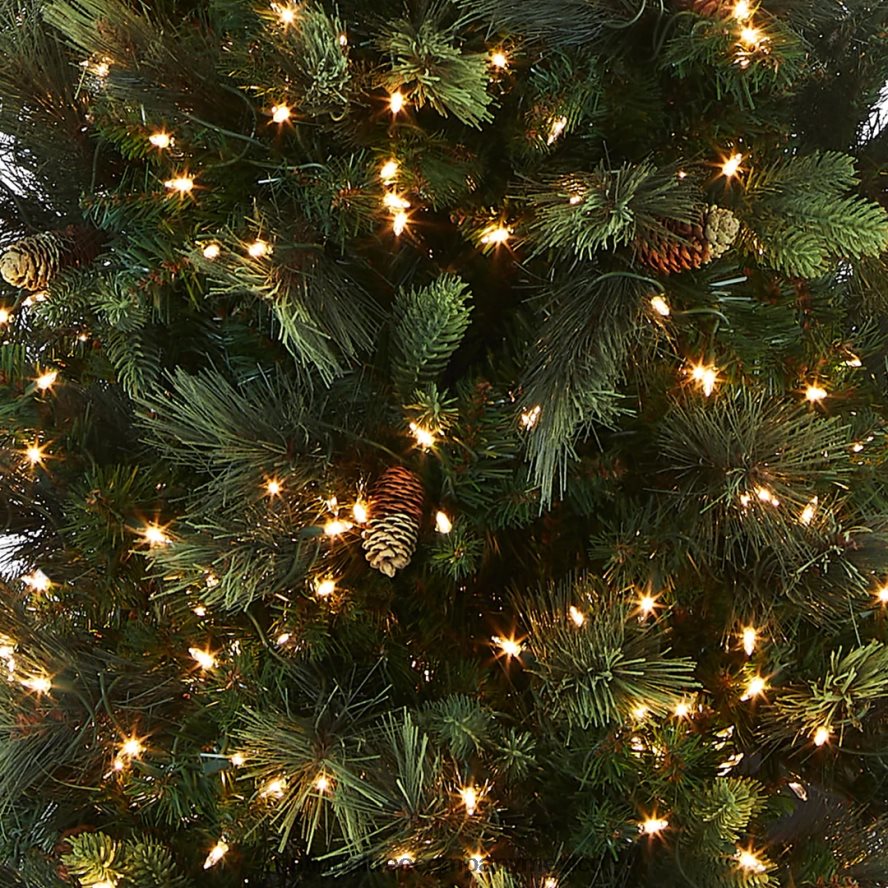 árboles | mx National Tree Company árbol de Navidad gigante artificial preiluminado 'feel real', verde, pino carolina, luces blancas, flocado con piñas, incluye soporte, 10 pies 8JB84J160