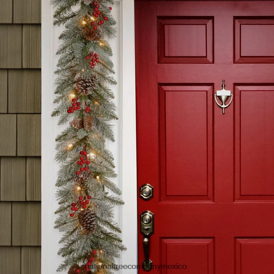 vegetación | mx National Tree Company guirnalda navideña artificial preiluminada, verde, cerdas nevadas, luces blancas, decorada con piñas, racimos de bayas, enchufable, colección navideña, 9 pies 8JB